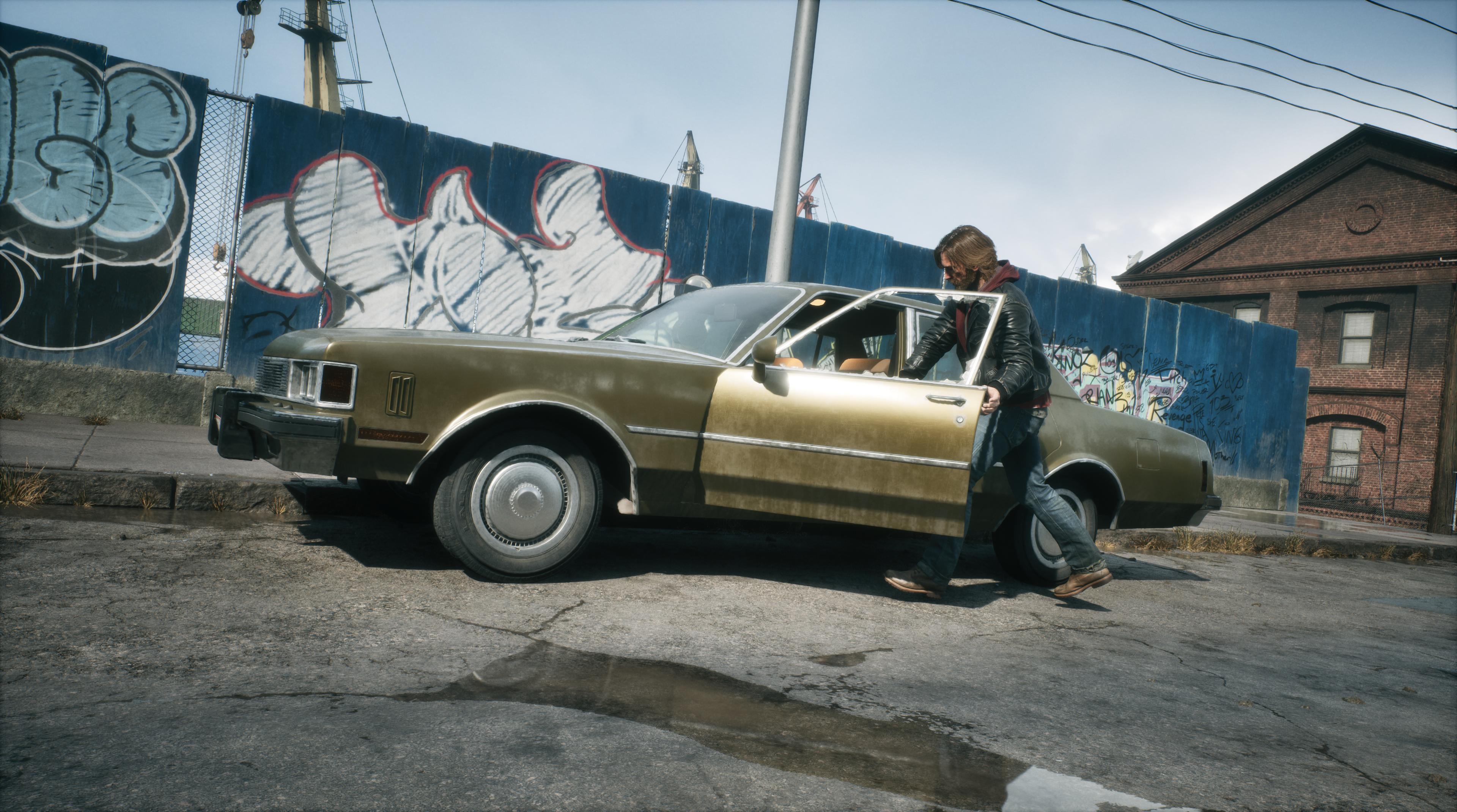 Samson et sa vieille américaine devant des graffitis